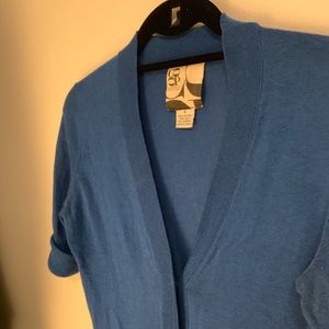 Barney’s coop blue cardigan with gold buttons